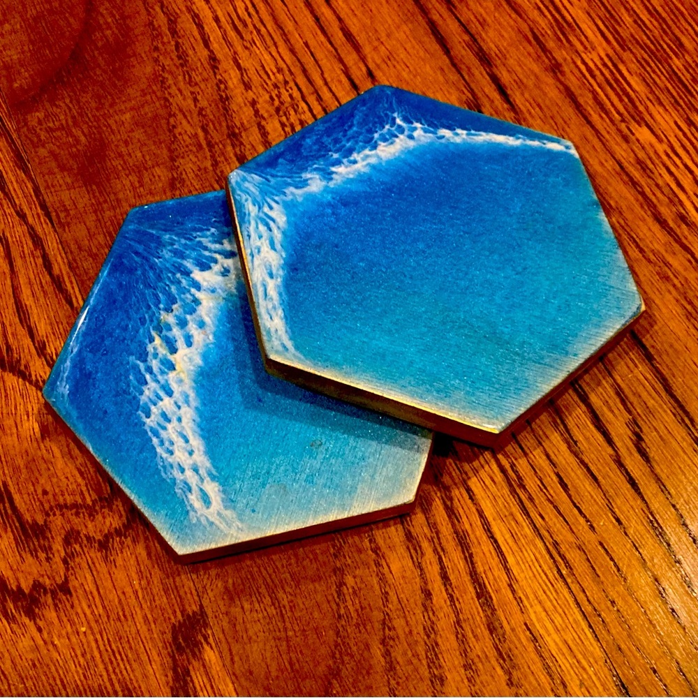 Handmade wooden coasters, blue/white epoxy gold painted edges. Ocean wave style.